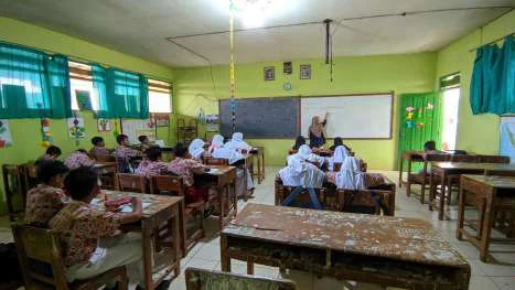 Mengajar di kelas hari ketiga